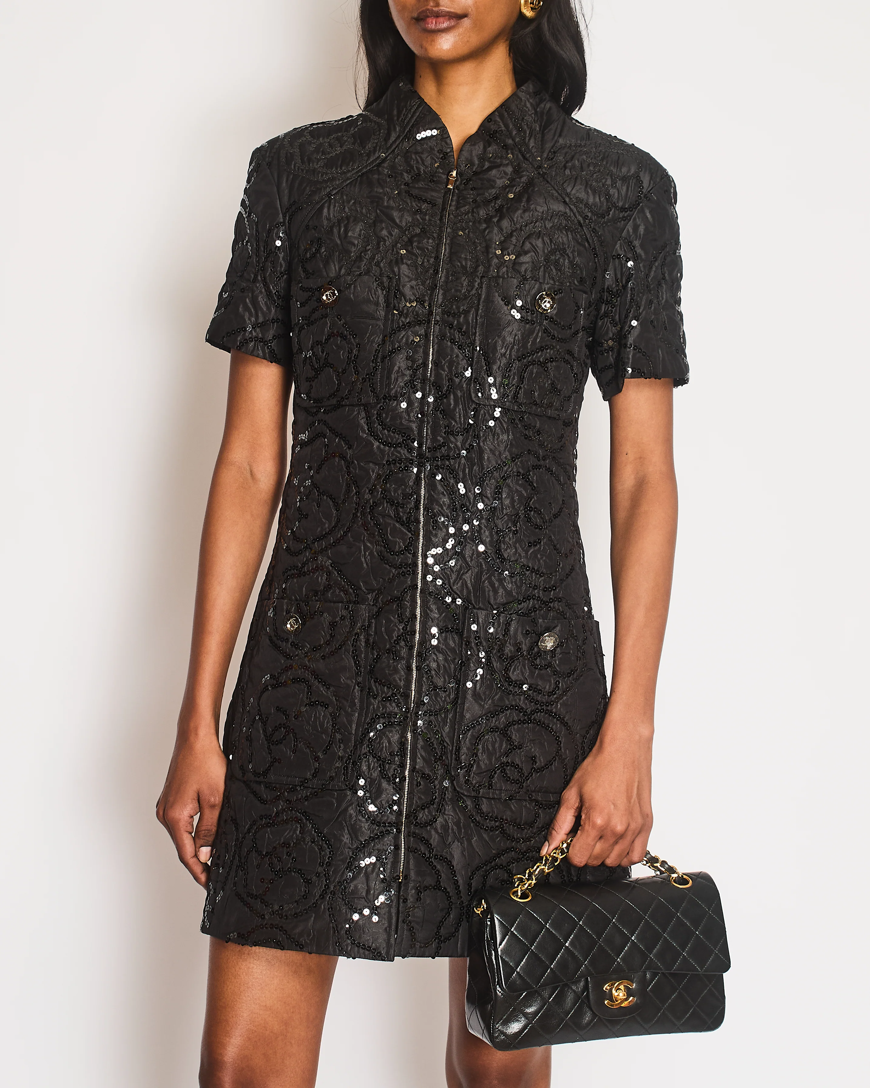 Chanel Black Padded Short-Sleeved Mini Dress with Sequin Camellia Embroideries and Front Pockets with Crystal CC Logo Buttons Size FR 38 (UK 10 - Image 2