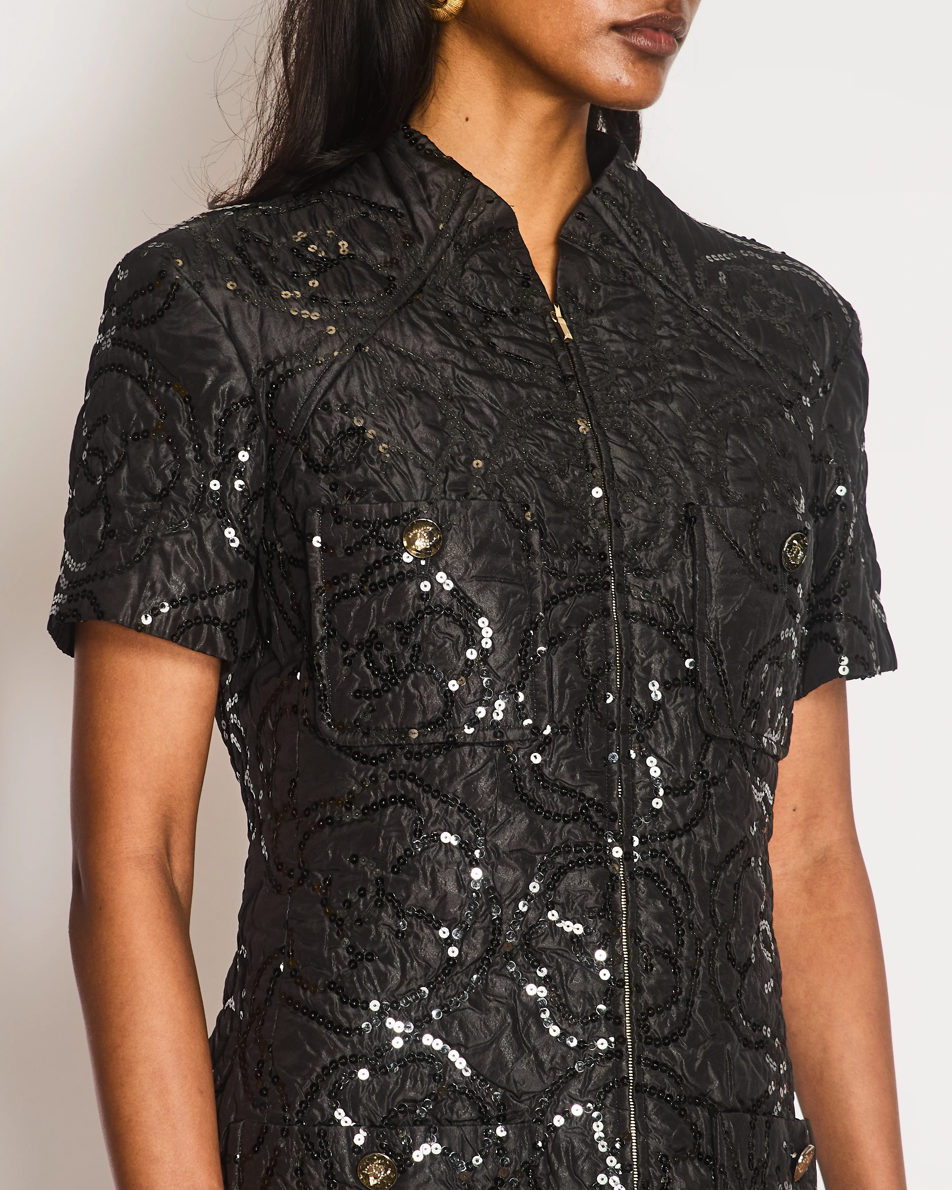 Chanel Black Padded Short-Sleeved Mini Dress with Sequin Camellia Embroideries and Front Pockets with Crystal CC Logo Buttons Size FR 38 (UK 10 - Image 3