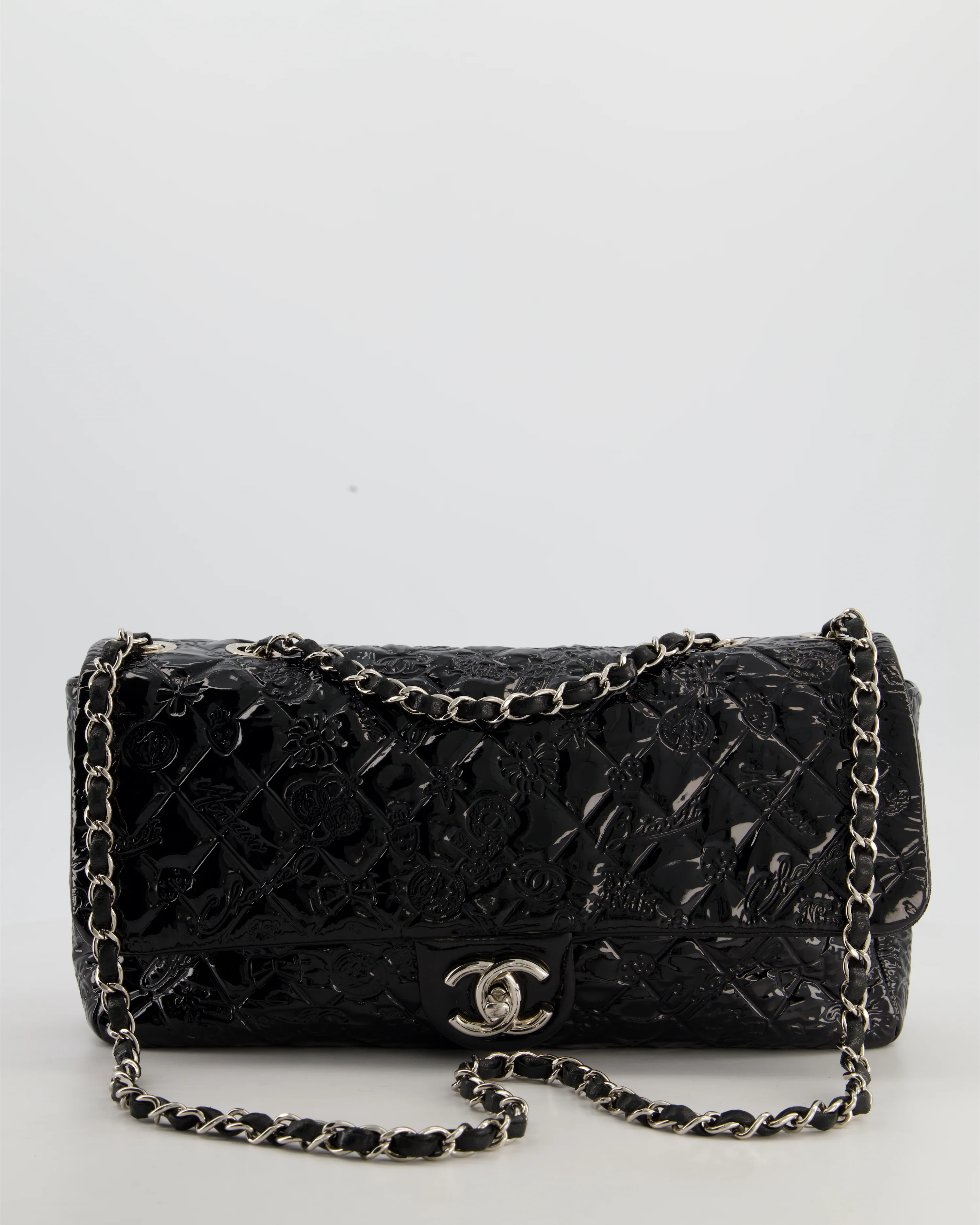Chanel Black Patent East West Single Flap Bag with Embossed Charm Details and Silver Hardware