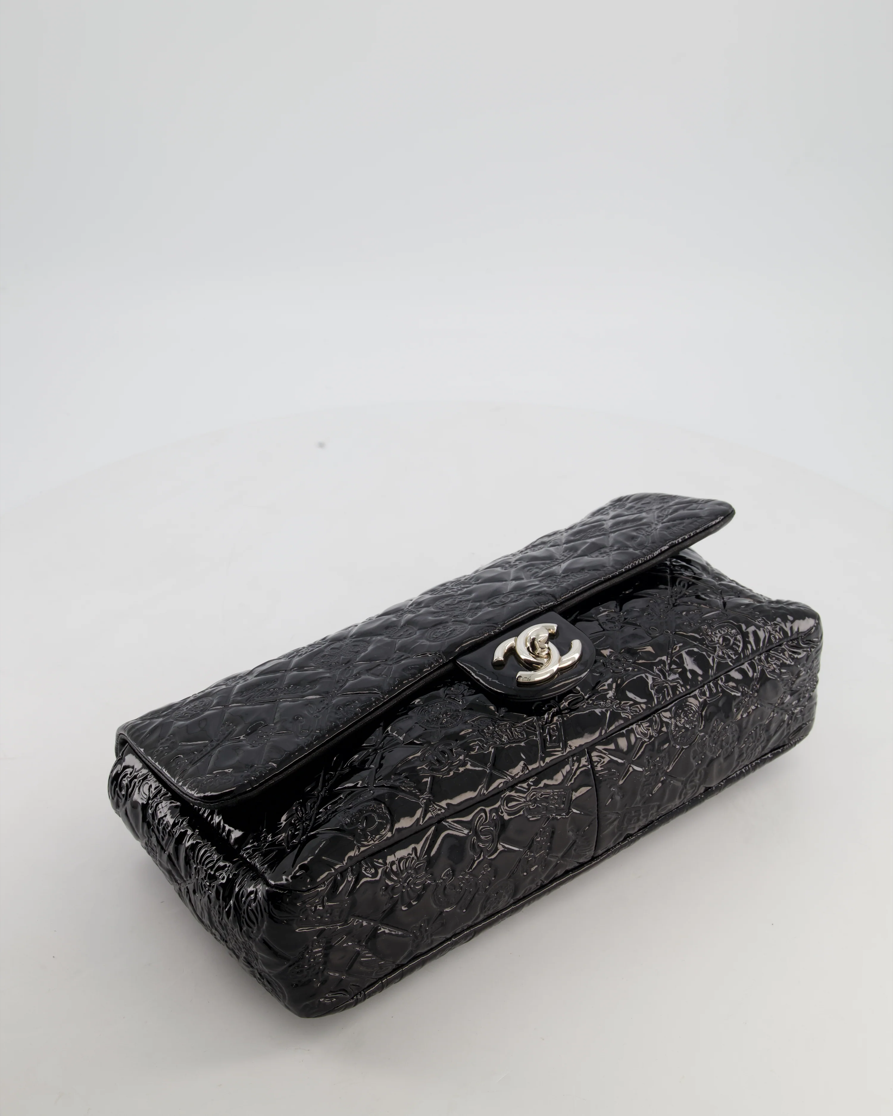 Chanel Black Patent East West Single Flap Bag with Embossed Charm Details and Silver Hardware - Image 17