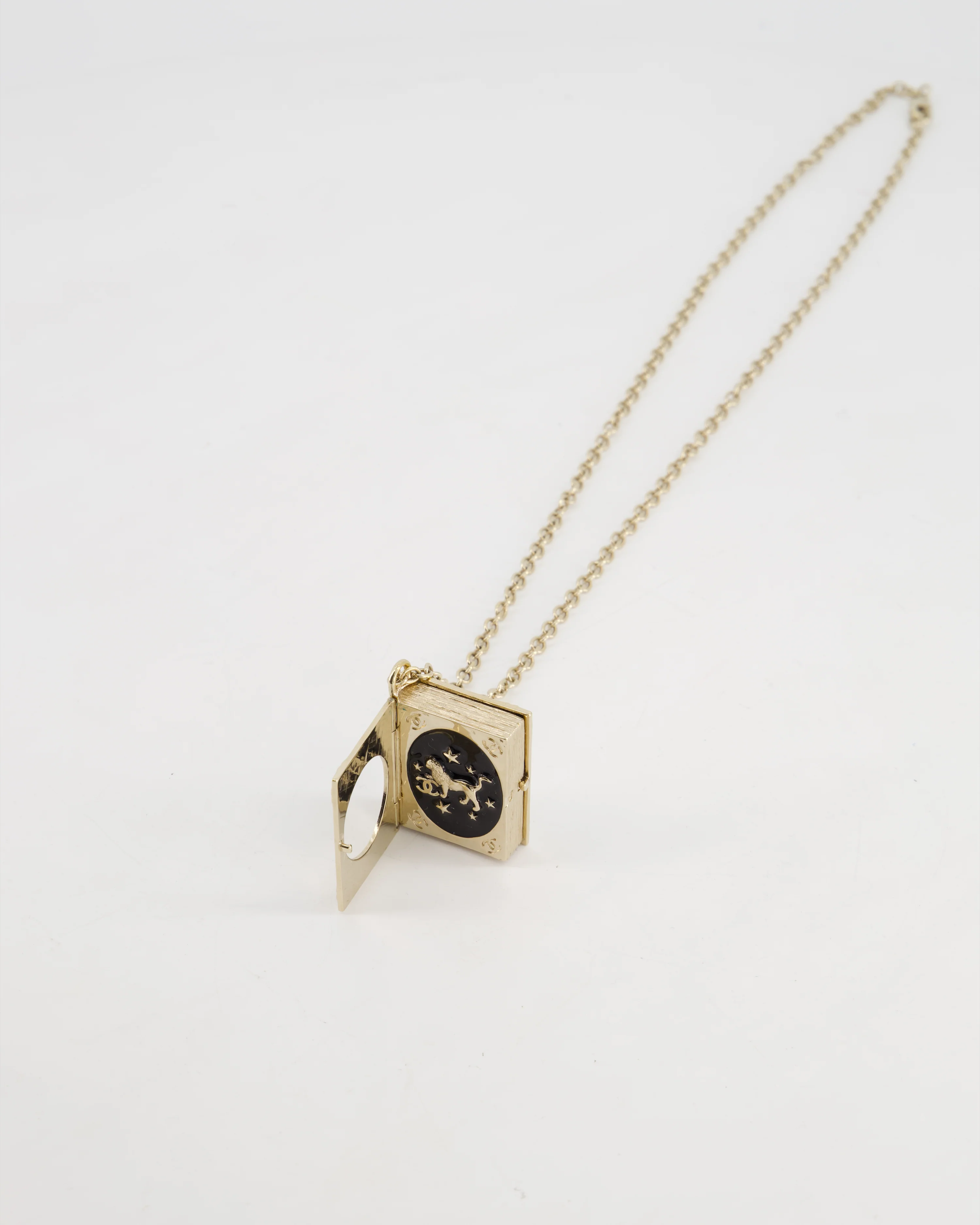 Chanel Champagne Gold, Star Lion and CC Logo Book Pendant Necklace - Image 8