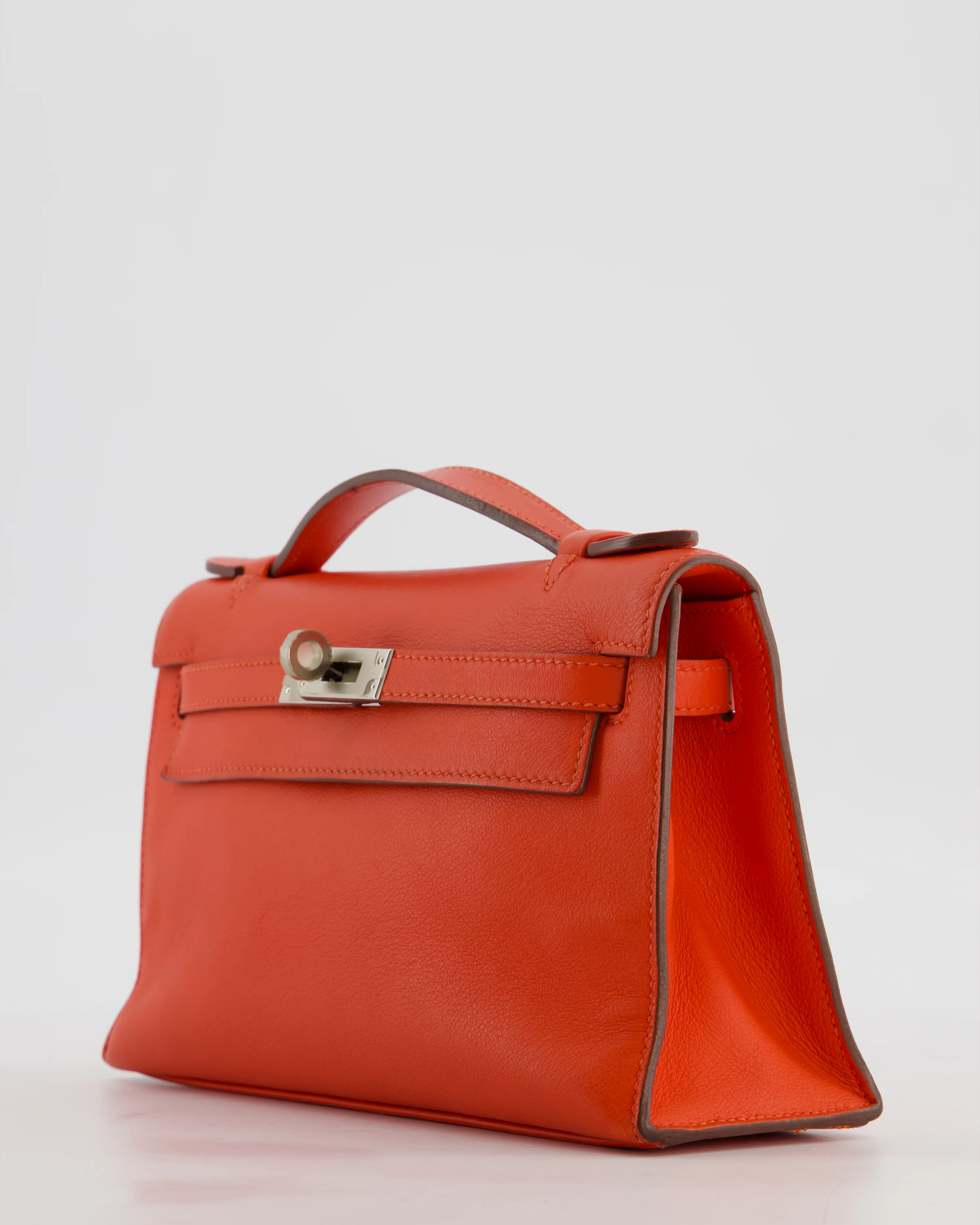 Hermès Kelly Pochette Bag in Capucine Swift Leather with Palladium Hardware - Image 11